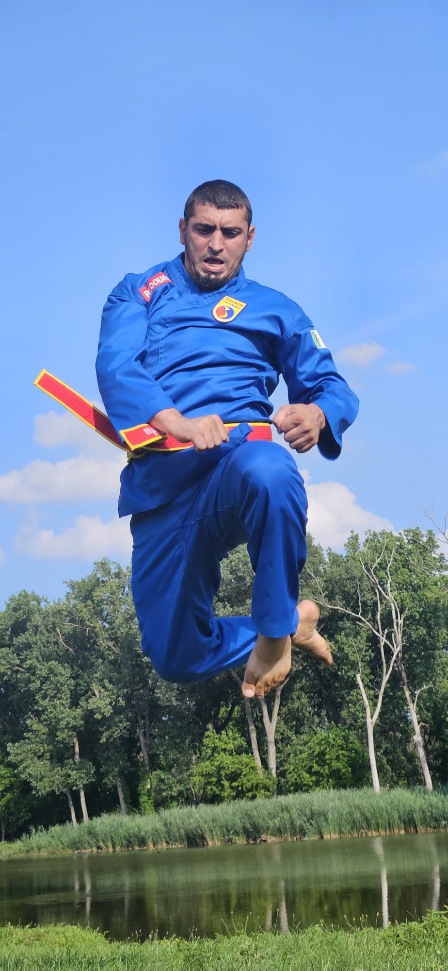 Mid-air flying knee strike, belt streaming