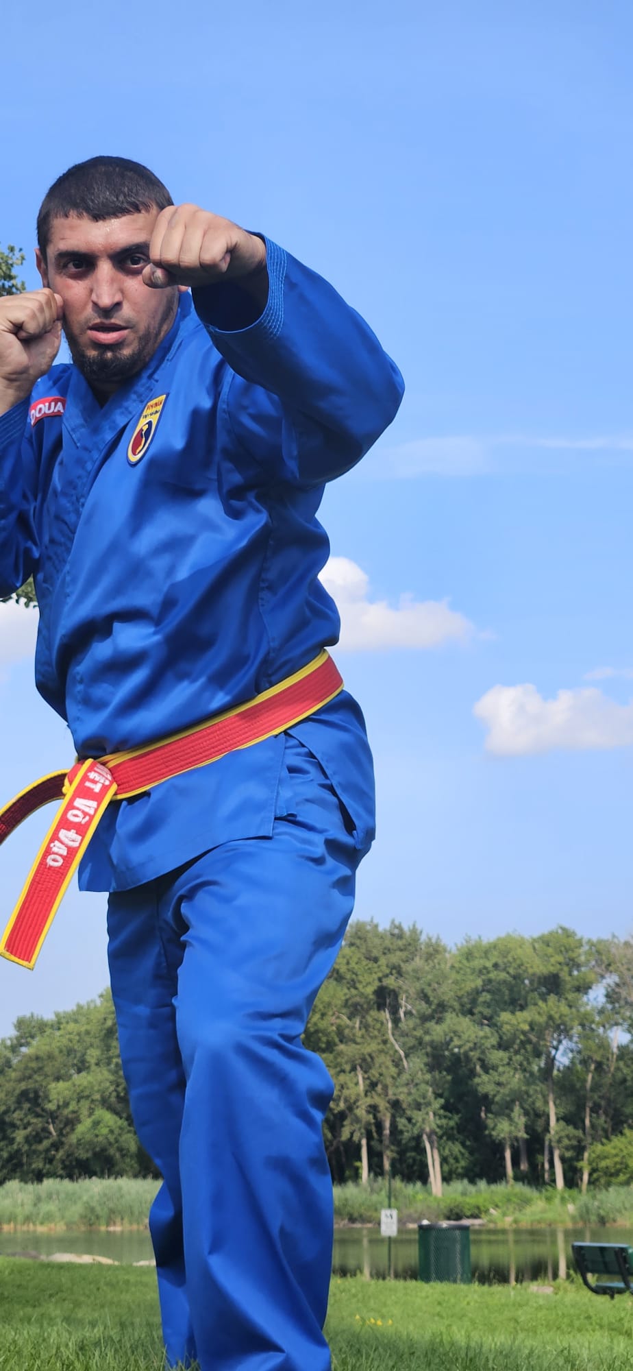 Fighting guard close-up — Viet Vo Dao gi and the red-yellow belt