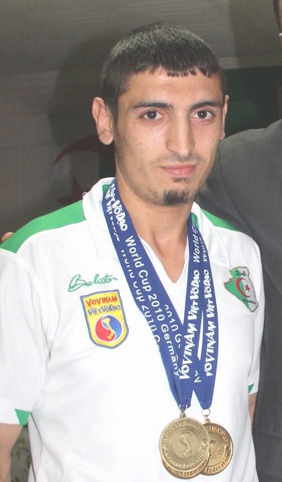 Redouane wearing his double World Cup 2010 gold medals