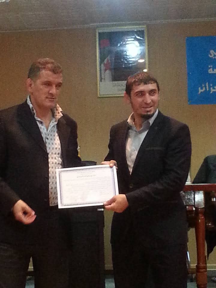 Redouane receiving an official diploma from the Algerian Ministry of Youth & Sports