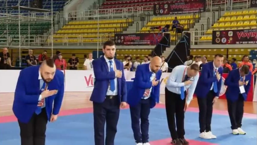 The international refereeing panel saluting at the Vietnam 2023 Worlds